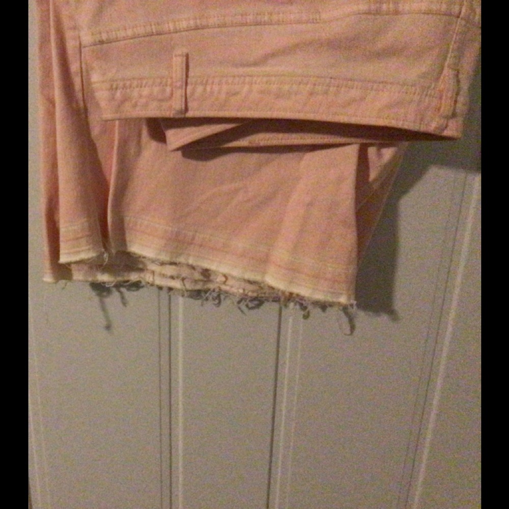 Cropped peach/blush jeans.